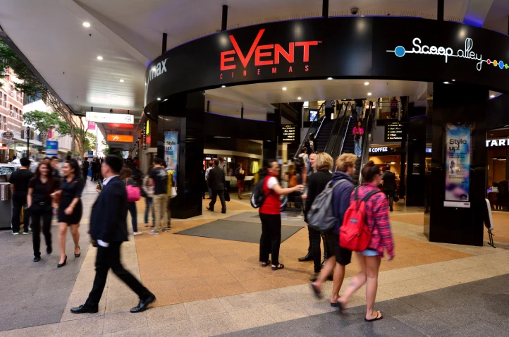 Retail shopping centre entrance in Brisbane City with customers entering and exiting stores for footfall measurement.